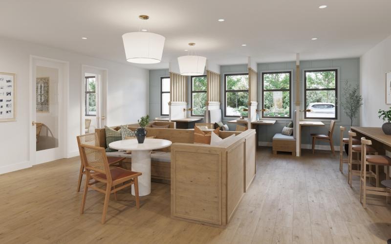 a clubroom with tables and chairs