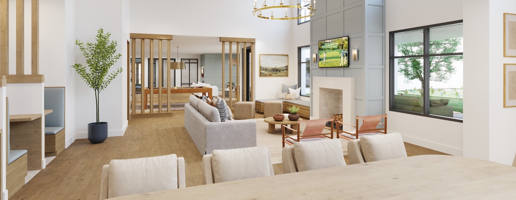 a clubroom with tables, chairs, a tv and a couch